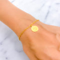 rich-vibrant-21k-gold-coin-bracelet