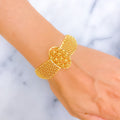 Dynamic Orb Heart 22k Gold Bangle Bracelet
