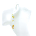 bold-poised-21k-gold-hanging-earrings