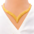 elegant-cutwork-22k-gold-v-shaped-necklace-set