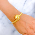 captivating-floral-cutwork-22k-gold-ball-bangle-bracelet