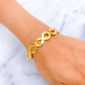 ornate-infinity-loop-22k-gold-bangle-bracelet