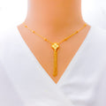 small-clover-tassel-22k-gold-necklace