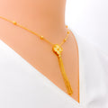 small-clover-tassel-22k-gold-necklace