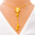 elevated-clover-tassel-22k-gold-necklace