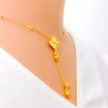 elevated-clover-tassel-22k-gold-necklace