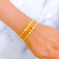 Impeccable Striped 22k Gold Pipe Bangles