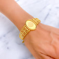 Glistening Tapered Oval 21K Gold Flexi Bangle Bracelet