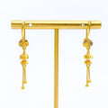 elevated-dangling-22k-gold-earrings