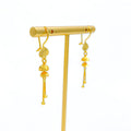 elevated-dangling-22k-gold-earrings