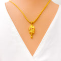 Curved Leaf Adorned 22K Gold Pendant 