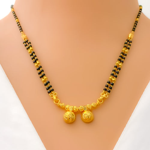 dazzling-vibrant-thali-22k-gold-mangal-sutra