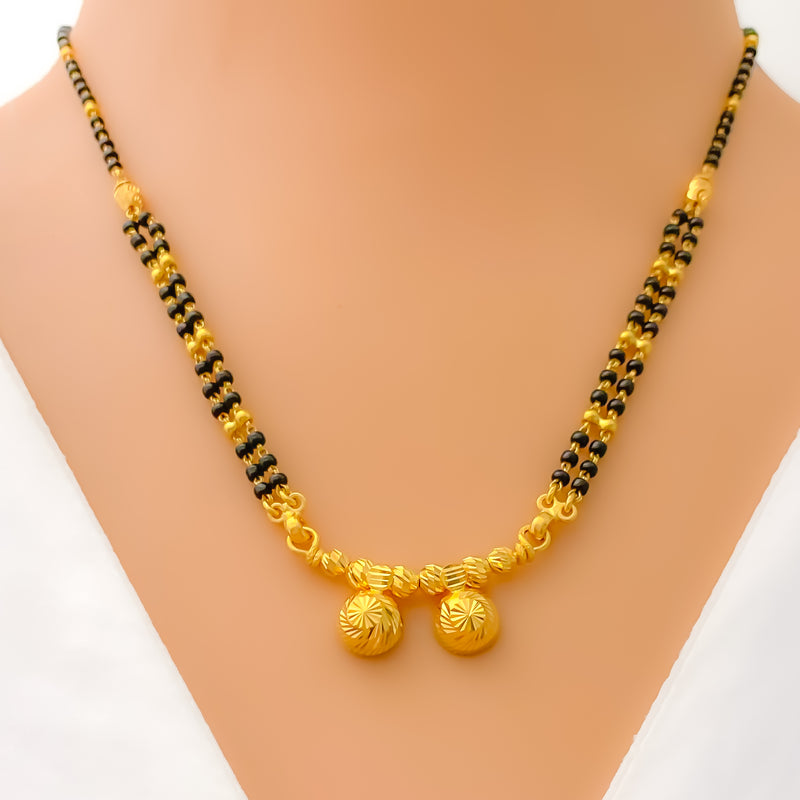 dazzling-vibrant-thali-22k-gold-mangal-sutra