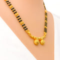 dazzling-vibrant-thali-22k-gold-mangal-sutra