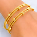 Couture Captivating 22k Gold Bangle Pair