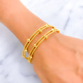 Couture Captivating 22k Gold Bangle Pair