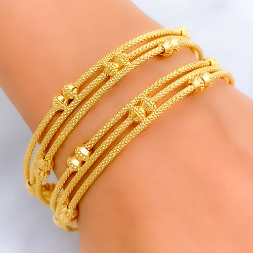 Edgy Lustrous 22k Gold Bangle Pair