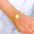 Radiant Round 21k Gold Floral Bracelet