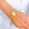 Modish Rectangular 21k Gold Flower Bracelet