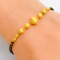 Fashionable Elevated 22k Gold Black Bead Bracelet