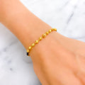 Graceful Jazzy 22k Gold Black Bead Bracelet