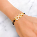 Glistening Elegant 22k Gold Black Bead Bracelet