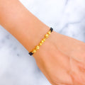 Sparkling Beadwork 22k Gold Black Bead Bracelet