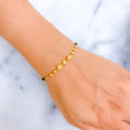 Regal Sophisticated 2k Gold Black Bead Bracelet