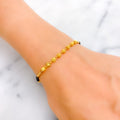 Stylish Brilliant 22k Gold Black Bead Bracelet