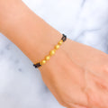 Noble Beaded 22k Gold Black Bead Bracelet