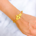 Glimmering High-Gloss 22k Gold Floral Bangle Bracelet 