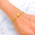 Elegant Sparkling 22k Gold Orb Flexi Bangle Bracelet