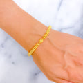 Sleek Lined 22k Gold Floral Bead Bracelet 