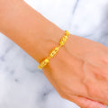 Graceful Triple Long Barrel 22k Gold Bracelet