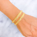 Charming Engraved 22k Gold Bangle Pair