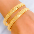 Charming Engraved 22k Gold Bangle Pair