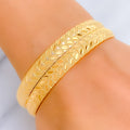 Charming Engraved 22k Gold Bangle Pair