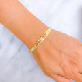 Graceful Two-Tone 22k Gold Bangle