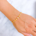 Classy Three-Tone 22k Gold Orb Bracelet