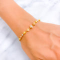 Classy Three-Tone 22k Gold Orb Bracelet