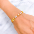 Dazzling Oval Barrel 22k Gold Orb Bracelet