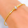 fancy-two-tone-22k-gold-bangle-bracelet