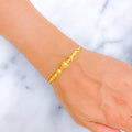 charming-orb-22k-gold-bangle-bracelet