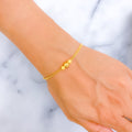 dazzling-orb-22k-gold-bracelet