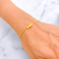 dazzling-orb-22k-gold-bracelet