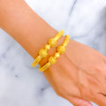 Eclectic Decadent 22k Gold Floral Pipe Bangles 