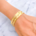 Iconic Contour 22k Gold CZ Bangle Pair 