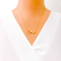 Asymmetrical Star Adorned 21k Gold CZ Necklace 