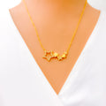 Asymmetrical Star Adorned 21k Gold CZ Necklace 