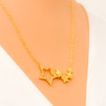 Asymmetrical Star Adorned 21k Gold CZ Necklace 